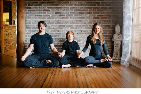 Family sitting and meditating