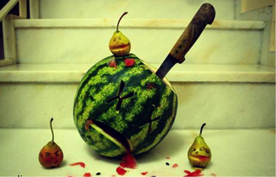 Watermelon stabbed with knife with x's for eyes